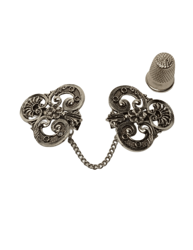 MANITAS 39mm triangular labrado tono...