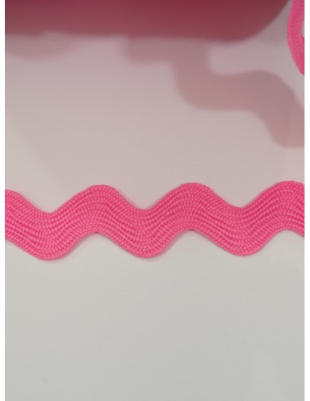 Piquillo poliéster rosa flúor