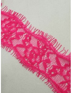 Encaje bordado fucsia flúor...