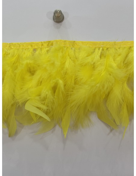 Pluma de pavo 12cm de ancho cosidas en tira