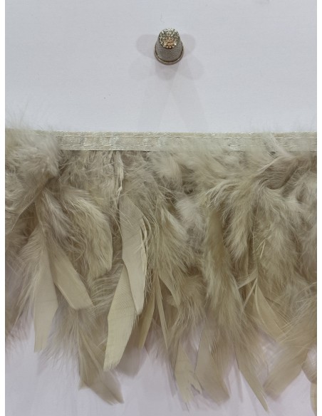 Pluma de pavo 12cm de ancho cosidas en tira